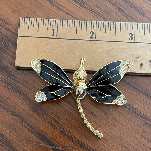 Golden Dragonfly Brooch with Diamonds | Elegant Jewelry  Elegant Dragonfly Brooch with Black and Gold Accents